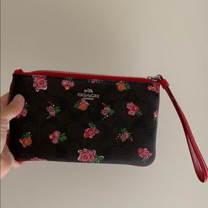 Coach monogram with Rose design wristlet